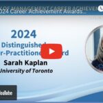 Screenshot of video with picture of sarah kaplan (gray hair, black glasses, dark blue shirt) and text describing distinguished sholarly practitioner award