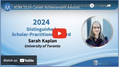 Screenshot of video with picture of sarah kaplan (gray hair, black glasses, dark blue shirt) and text describing distinguished sholarly practitioner award